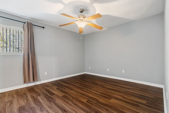 empty room featuring ceiling fan and wood-type flooring