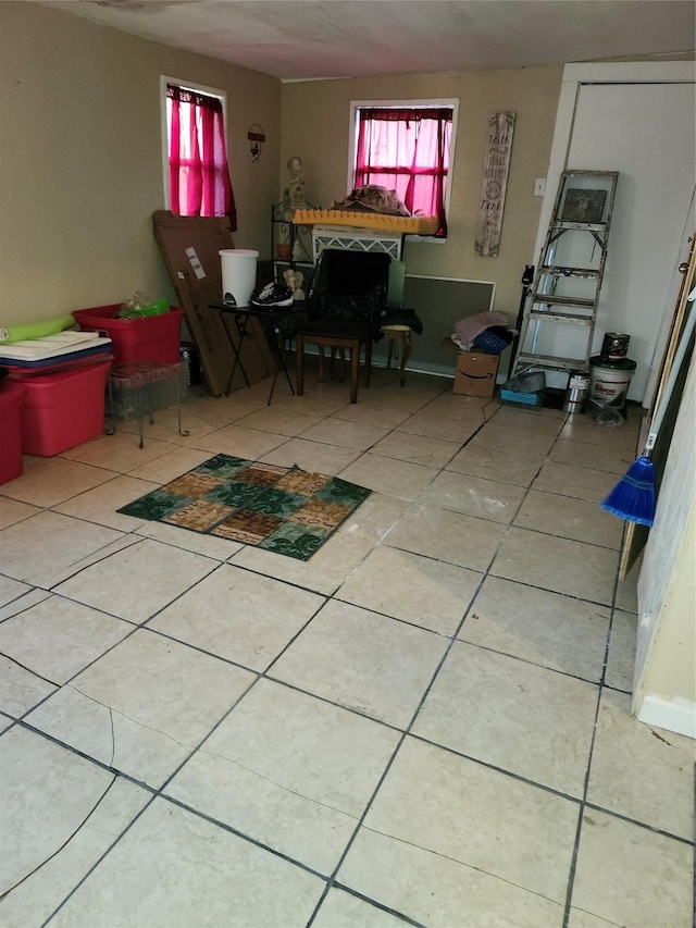 dining space with plenty of natural light and tile patterned floors