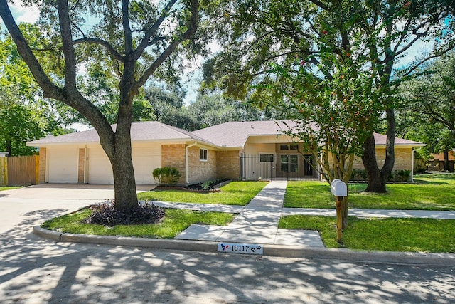 ranch-style house featuring a garage