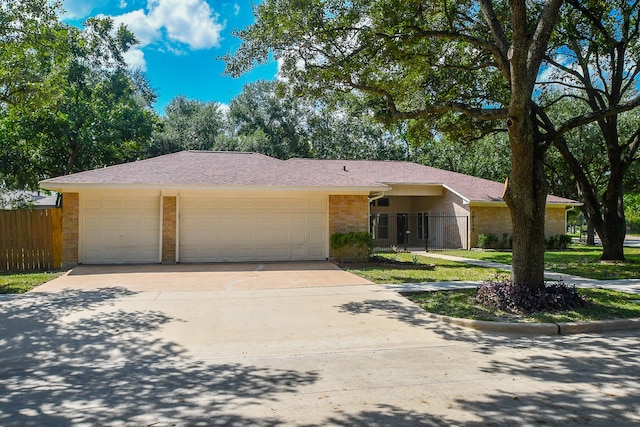 single story home with a garage