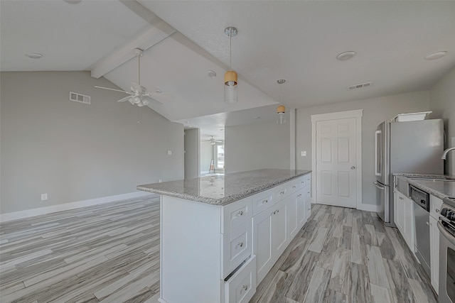 kitchen featuring pendant lighting, lofted ceiling with beams, ceiling fan, light hardwood / wood-style floors, and white cabinetry