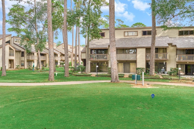 12900 Walden Rd Unit 105A, Montgomery, TX 77356 - view of building exterior featuring a residential view