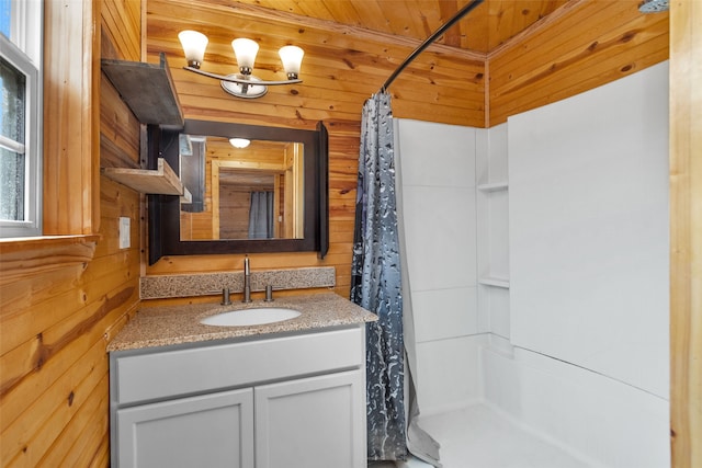 bathroom with a shower with curtain, vanity, wooden ceiling, and wooden walls