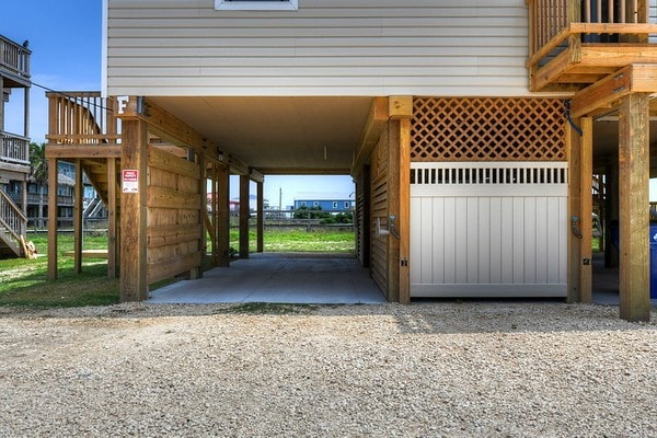 exterior space with a carport