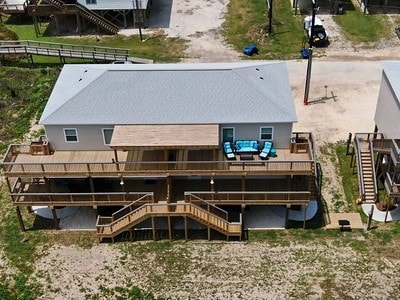 rear view of house with a deck