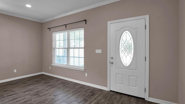 entrance foyer featuring ornamental molding and dark wood-type flooring