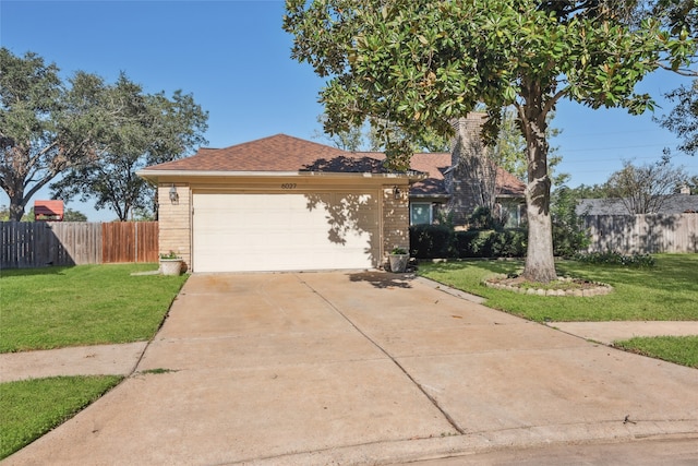 single story home with a front yard