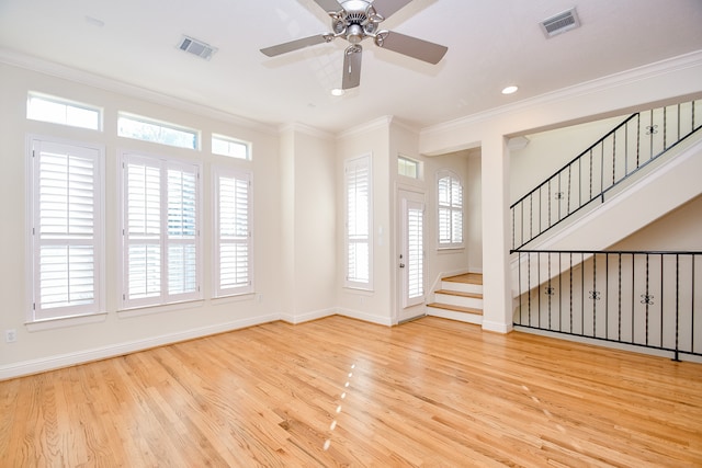 entryway featuring ceiling fan, light hardwood / wood-style flooring, and ornamental molding