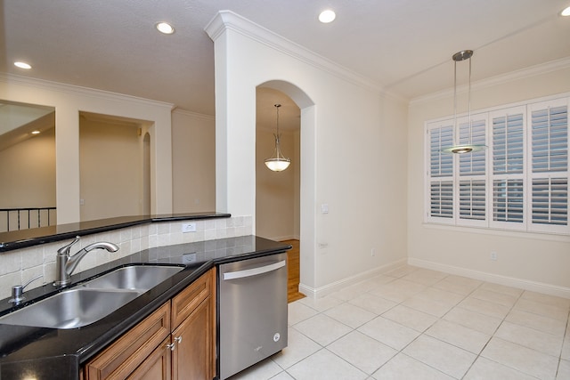 kitchen with dishwasher, decorative backsplash, decorative light fixtures, and sink