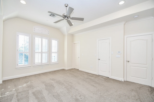 unfurnished room featuring ceiling fan, light colored carpet, and lofted ceiling