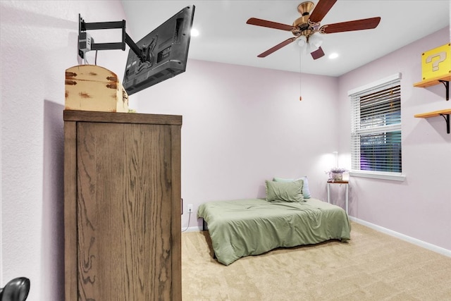 bedroom featuring ceiling fan and carpet floors