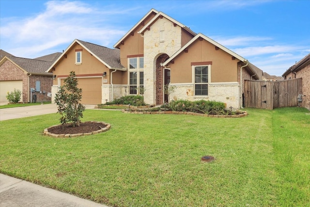 view of front facade with a garage and a front yard