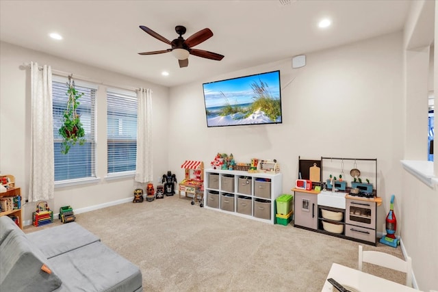 game room with ceiling fan and carpet floors