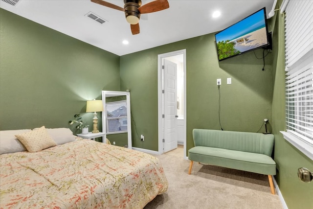 carpeted bedroom with ceiling fan