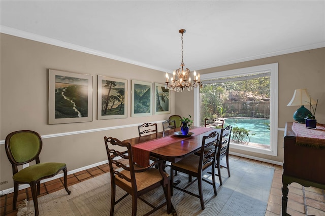 dining area featuring light tile patterned floors, a notable chandelier, and ornamental molding