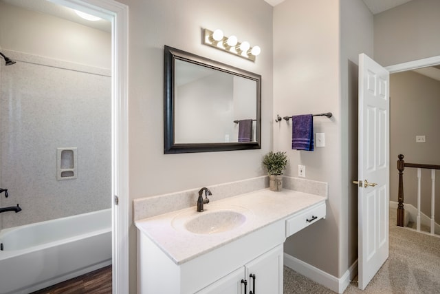 bathroom with vanity and shower / tub combination