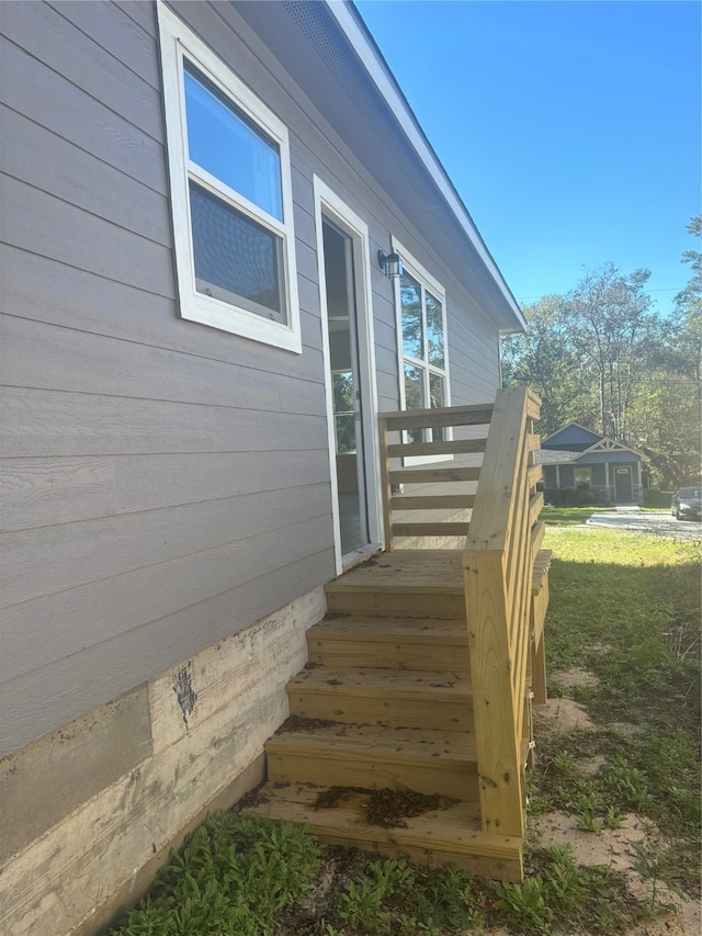 view of home's exterior featuring a lawn