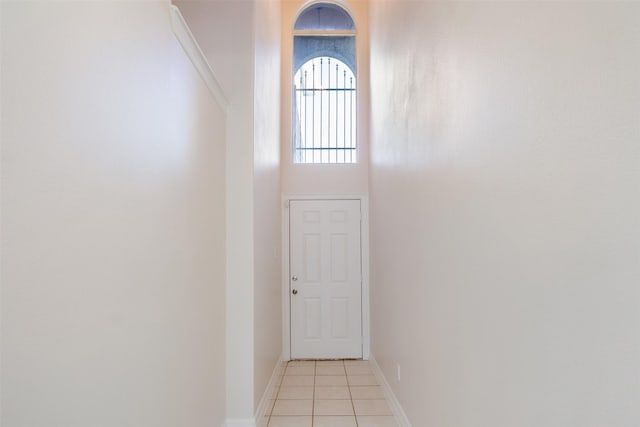 entryway featuring light tile patterned floors