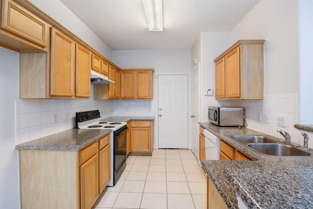 kitchen featuring decorative backsplash, white dishwasher, black range with electric stovetop, and sink