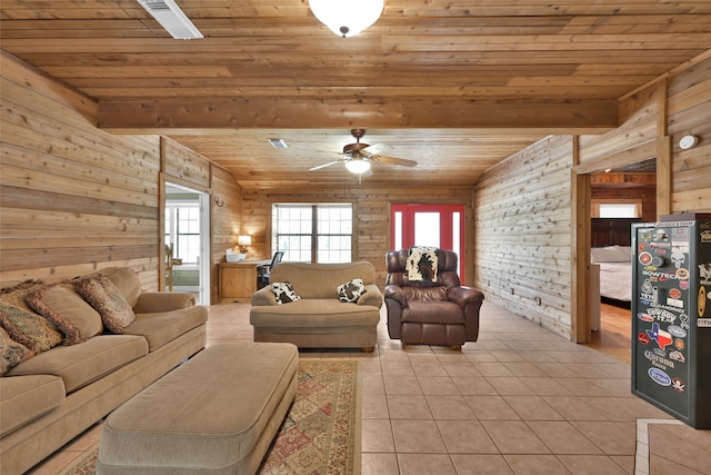 living room featuring a wealth of natural light and wooden ceiling