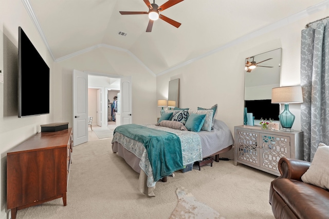 carpeted bedroom with vaulted ceiling, ceiling fan, and ornamental molding