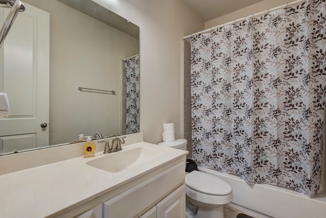 full bathroom featuring vanity, toilet, and shower / bathtub combination with curtain