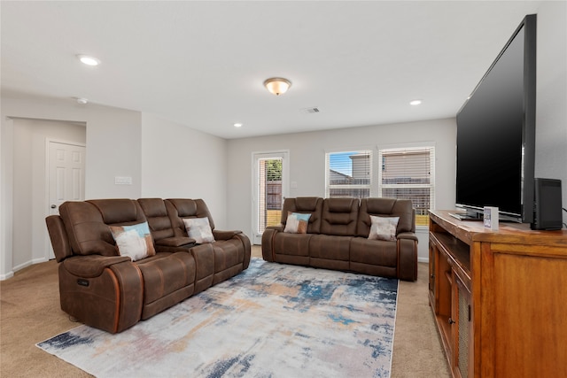 living room featuring light carpet