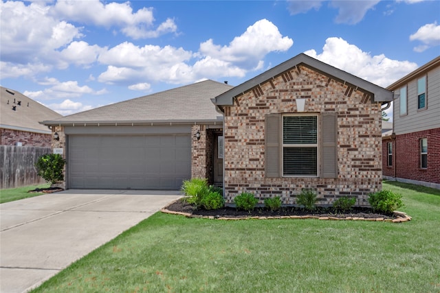 view of front facade with a garage and a front lawn