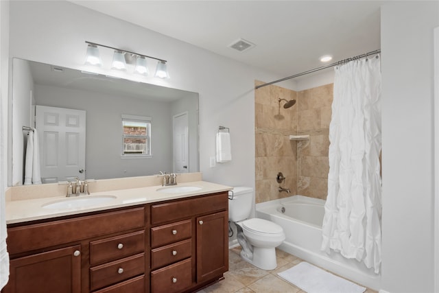 full bathroom featuring tile patterned flooring, vanity, toilet, and shower / bathtub combination with curtain