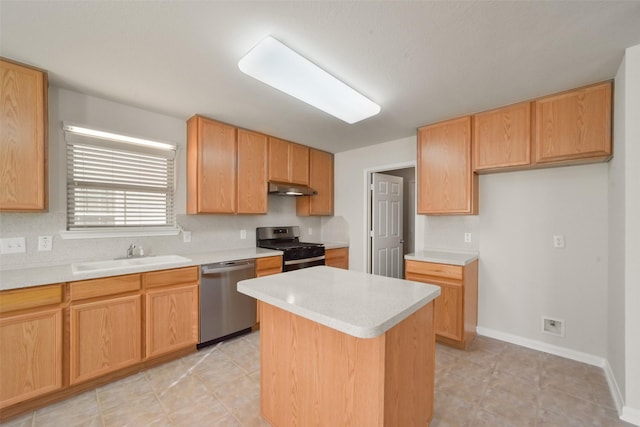 kitchen featuring a center island, sink, and appliances with stainless steel finishes