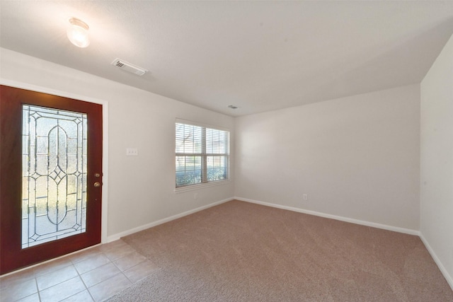 entryway with light carpet