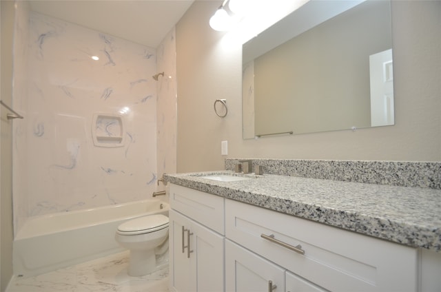 full bathroom featuring toilet, vanity, and tiled shower / bath