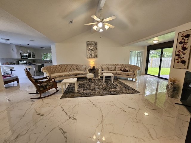 living room featuring ceiling fan, lofted ceiling with beams, and a textured ceiling