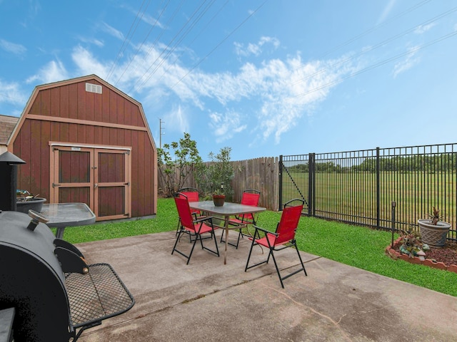 view of patio / terrace featuring a shed