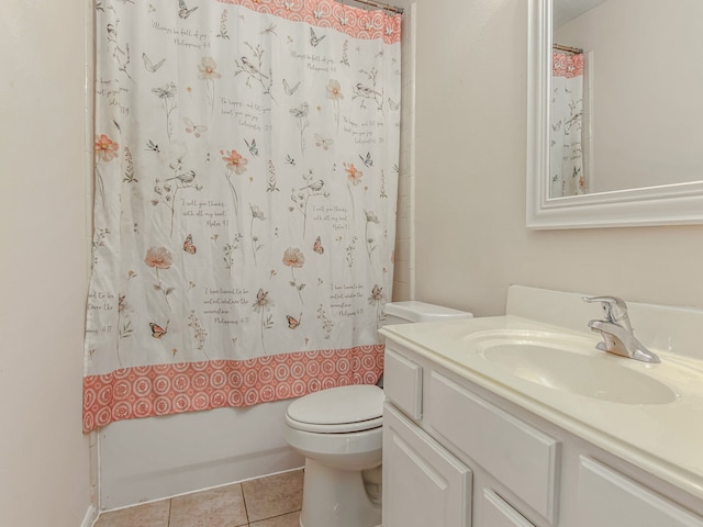 full bathroom with toilet, vanity, tile patterned floors, and shower / bath combo with shower curtain