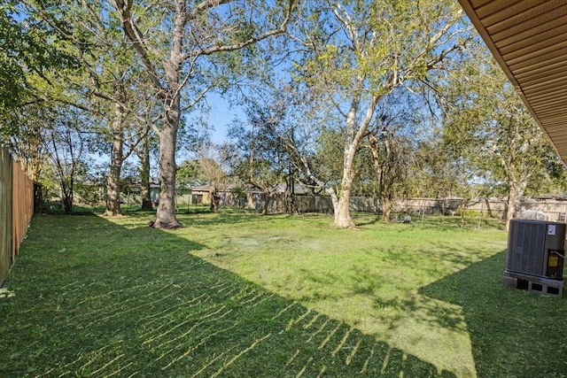 view of yard featuring central AC