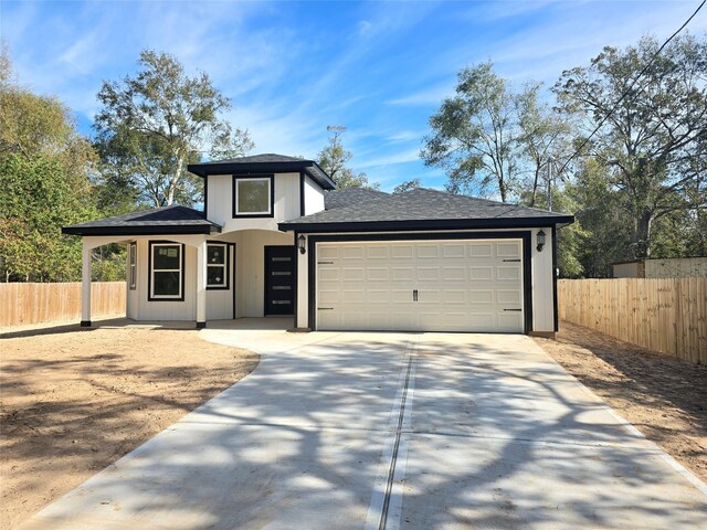 view of front of home featuring a garage