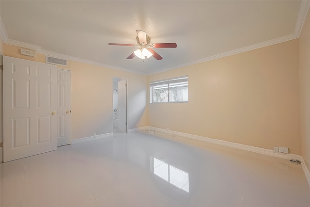 unfurnished room featuring light tile patterned floors, ceiling fan, and crown molding