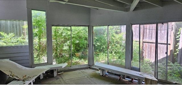 unfurnished sunroom featuring plenty of natural light