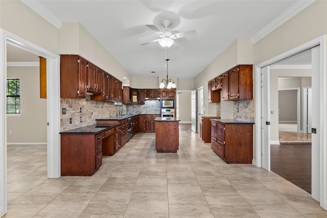 kitchen with a center island, tasteful backsplash, ornamental molding, and stainless steel oven