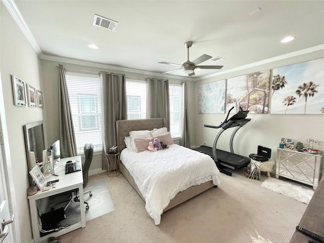 bedroom featuring ceiling fan, crown molding, and light carpet