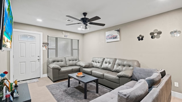 living room featuring ceiling fan