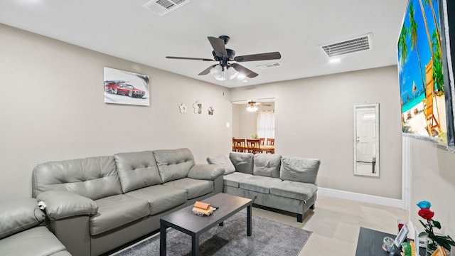 living room with ceiling fan