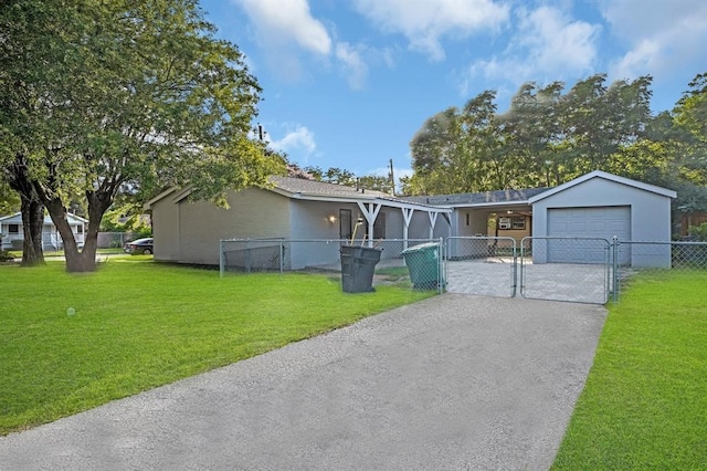 view of front facade featuring a front yard and a garage