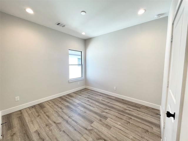 empty room with light wood-type flooring