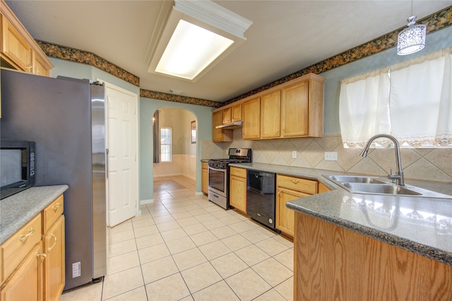 kitchen with black appliances, plenty of natural light, sink, and decorative light fixtures