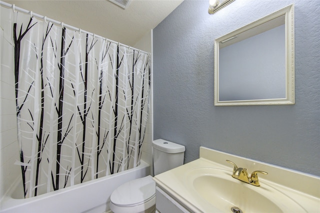 full bathroom featuring vanity, toilet, shower / bathtub combination with curtain, and a textured ceiling