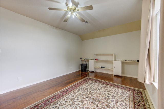 washroom with ceiling fan and dark wood-type flooring