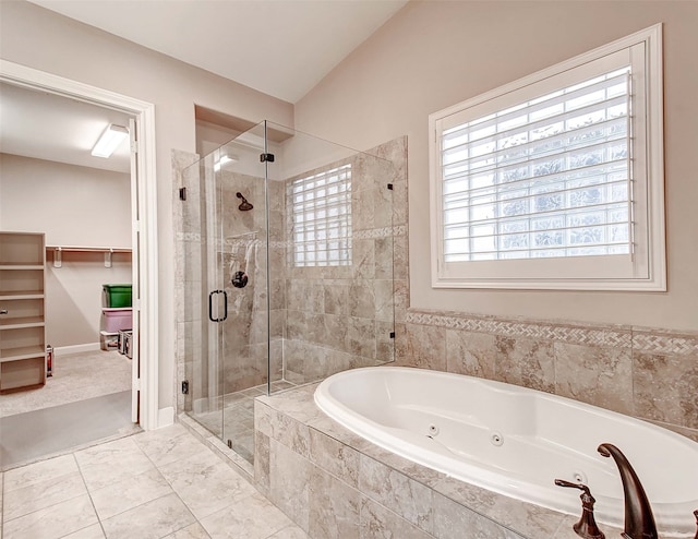 bathroom with separate shower and tub