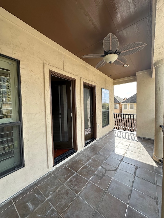 view of patio featuring ceiling fan